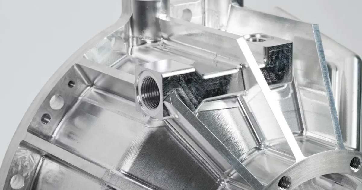 Aerospace CNC machining Vietnam — complex aluminum housing multi-axis compound geometry threaded ports VNcontX HCMC