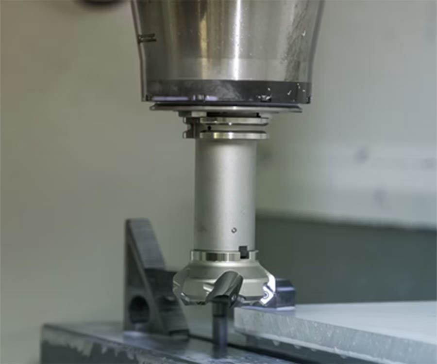 CNC plastic machining Vietnam — POM Delrin and PEEK parts on DMG Mori 5-axis at VNcontX Bình Chánh facility