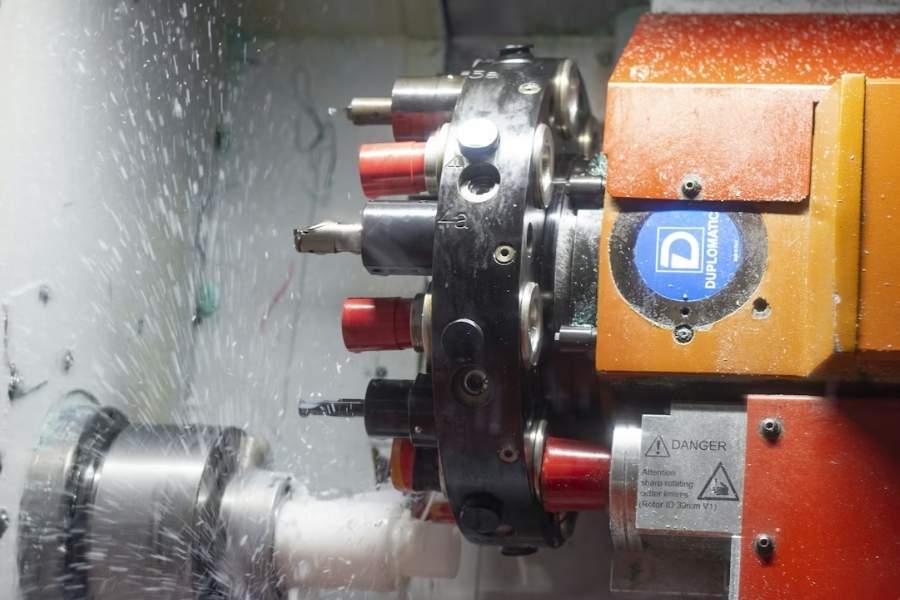 CNC machine cutting metal — copper and bronze CNC turning services at VNcontX Ho Chi Minh City Vietnam