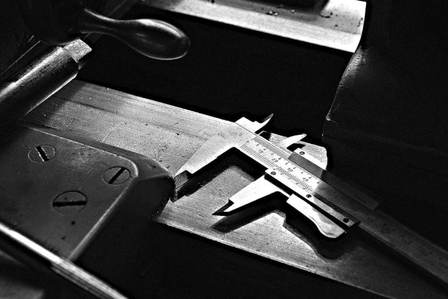 vernier caliper close-up precision measurement CNC machined parts Vietnam